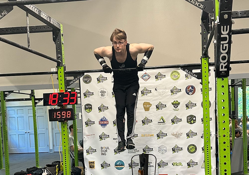 David Lloyd George (PHYS 2024) breaks the world record for the most muscle-ups in 24 hours.