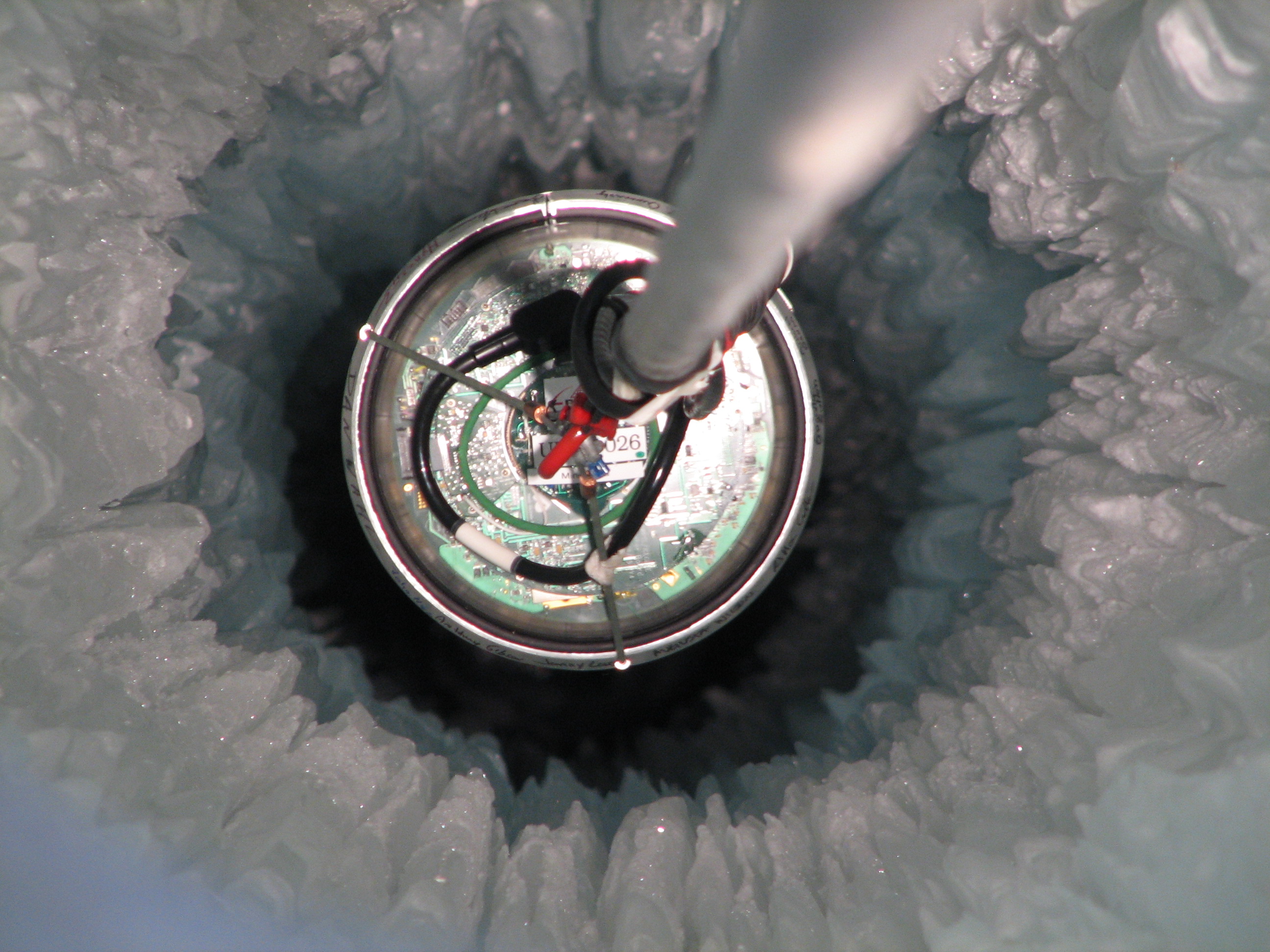 A neutrino detector about to be placed in the Antarctic ice. (Photo credit Mark Krasberg, IceCube/NSF)