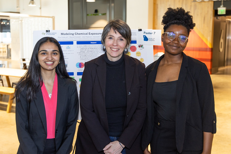 Students Diya Godavarti and Waynell Simbafo with Chemistry faculty Pamela Pollet