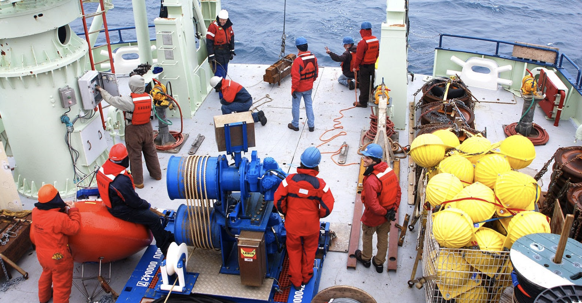 Researchers with OSNAP (Overturning in the Subpolar North Atlantic) prepare to launch marine sensors. (Photo: Heather Furey, Woods Hole Oceanographic Institution)