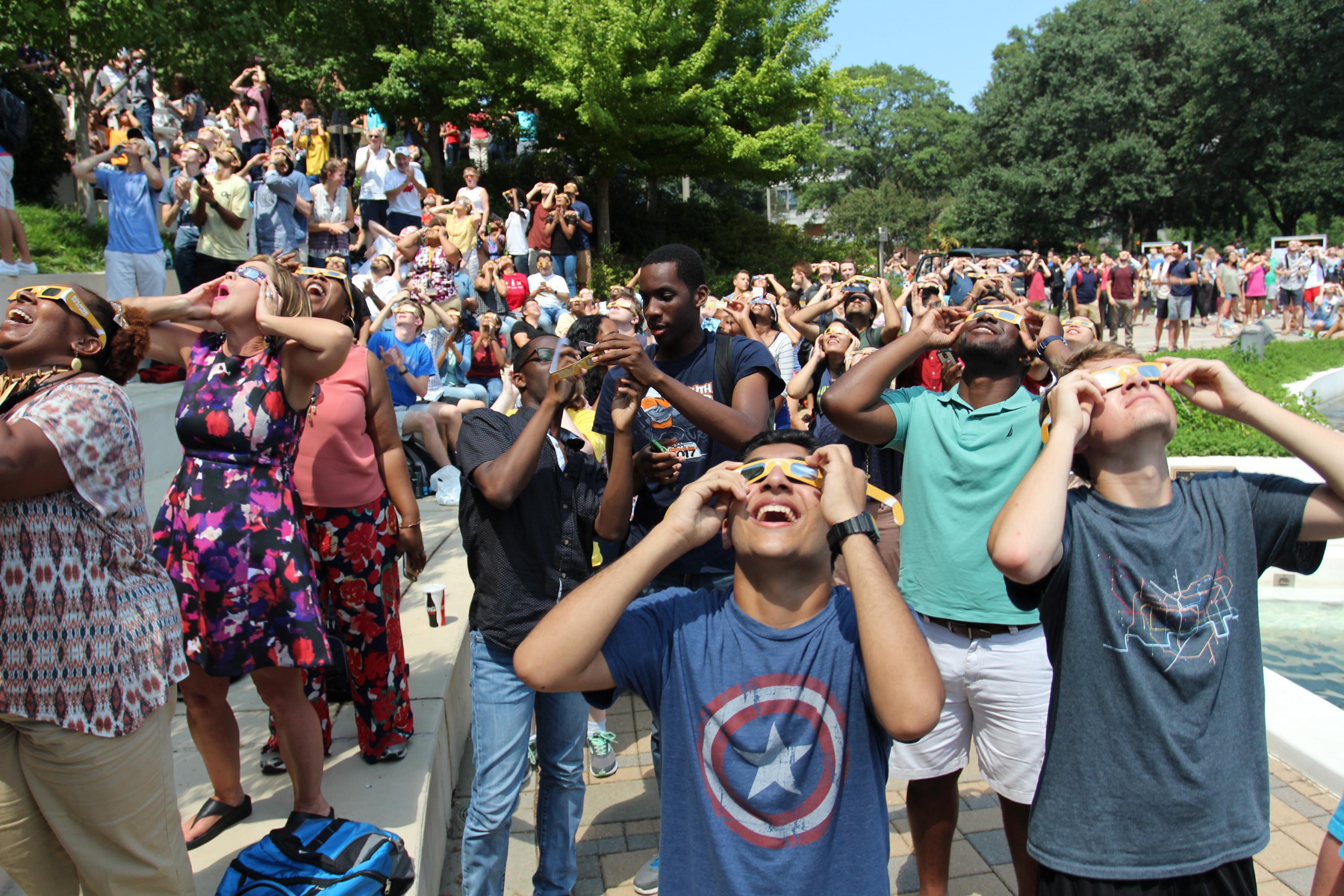 Members of the Georgia Tech community react to Monday's solar eclipse. (Photo by Renay San Miguel) 
