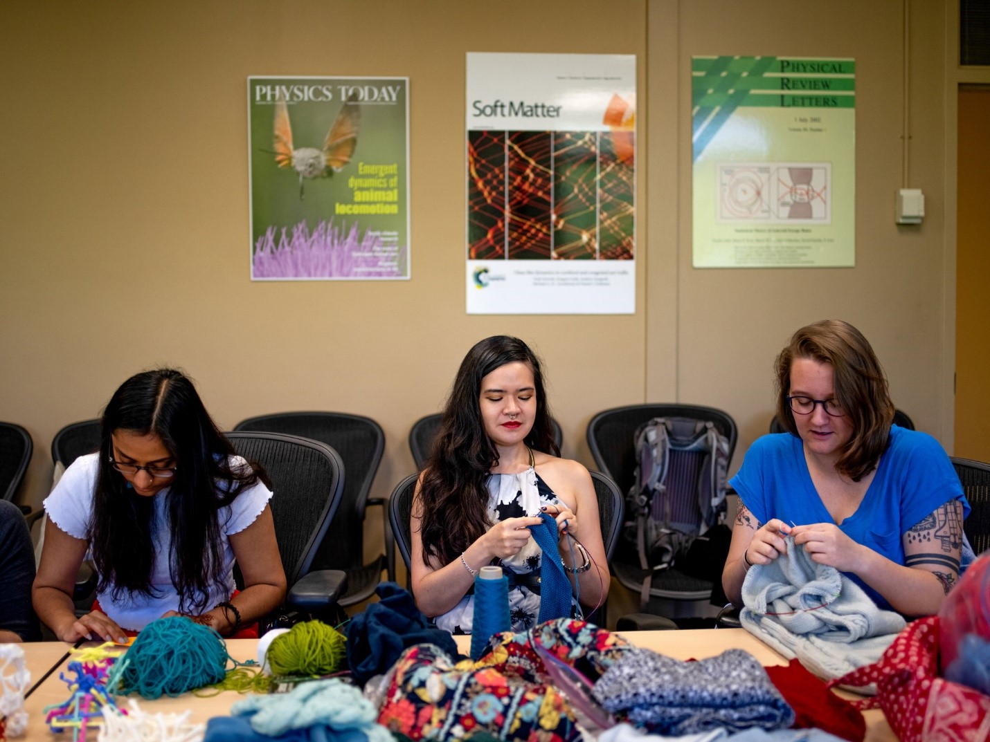 Elisabetta Matsumoto (center) knits with two of her Matsumoto Group lab students at Georgia Tech. (Photo Jonathan Kelso, The New York Times.)