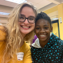 Diana Toro (left) with a student from Scott Elementary School Diana Toro (left) with a student from Scott Elementary School
