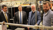 (From left) Georgia Congressman Tom Graves, NASA Administrator Jim Bridenstine, School of Chemistry and Biochemistry Professor Thom Orlando, and postdoctoral researcher Zach Seibers in the REVEALS lab. (Photo by Renay San Miguel) (From left) Georgia Congressman Tom Graves, NASA Administrator Jim Bridenstine, School of Chemistry and Biochemistry Professor Thom Orlando, and postdoctoral researcher Zach Seibers in the REVEALS lab. (Photo by Renay San Miguel)