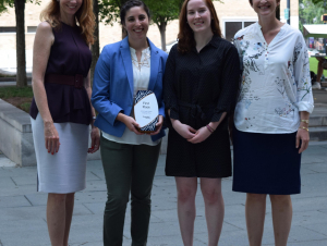 All smiles for first prize. From left: Kim Cobb, Brook Rothschild-Mancinelli, Rebecca Guth-Metzler, and Beril Toktay. Team member Priyam Raut is not pictured.