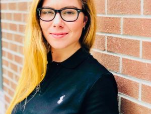 Courtney Astore is balancing teaching, classes, and research this summer.