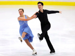 Tyler Vollmer (right) skates with ice dance partner Breelie Taylor.