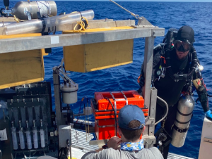 Divers preparing the autonomous benthic lander vehicle developed by Georgia Tech's Martial Taillefert during exploration of the Gulf of Mexico's "blue holes." (Photo Florida Atlantic University)