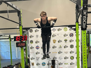 David Lloyd George (PHYS 2024) breaks the world record for the most muscle-ups in 24 hours.