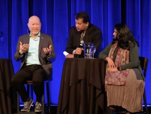 John Wise, left, speaks at the 2024 Asimov Debate