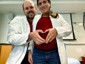 Christina Ragan (right) and her husband Zachary Grieb have studied the neuroscience of mental health and parenthood for years, and are now set to become parents themselves.