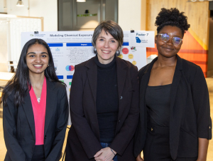 Students Diya Godavarti and Waynell Simbafo with Chemistry faculty Pamela Pollet