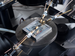 Image shows organic-thin film transistors for organic semiconductors under continuous testing on a probe station. (Photo Rob Felt Georgia Tech)