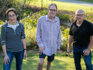 Researchers by campus wetlands