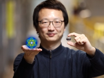 Researcher Xiaojian Bai and his colleagues used neutrons at ORNL’s Spallation Neutron Source to discover hidden quantum fluctuations in a rather simple iron-iodide material discovered in 1929. (Credit: ORNL/Genevieve Martin) 