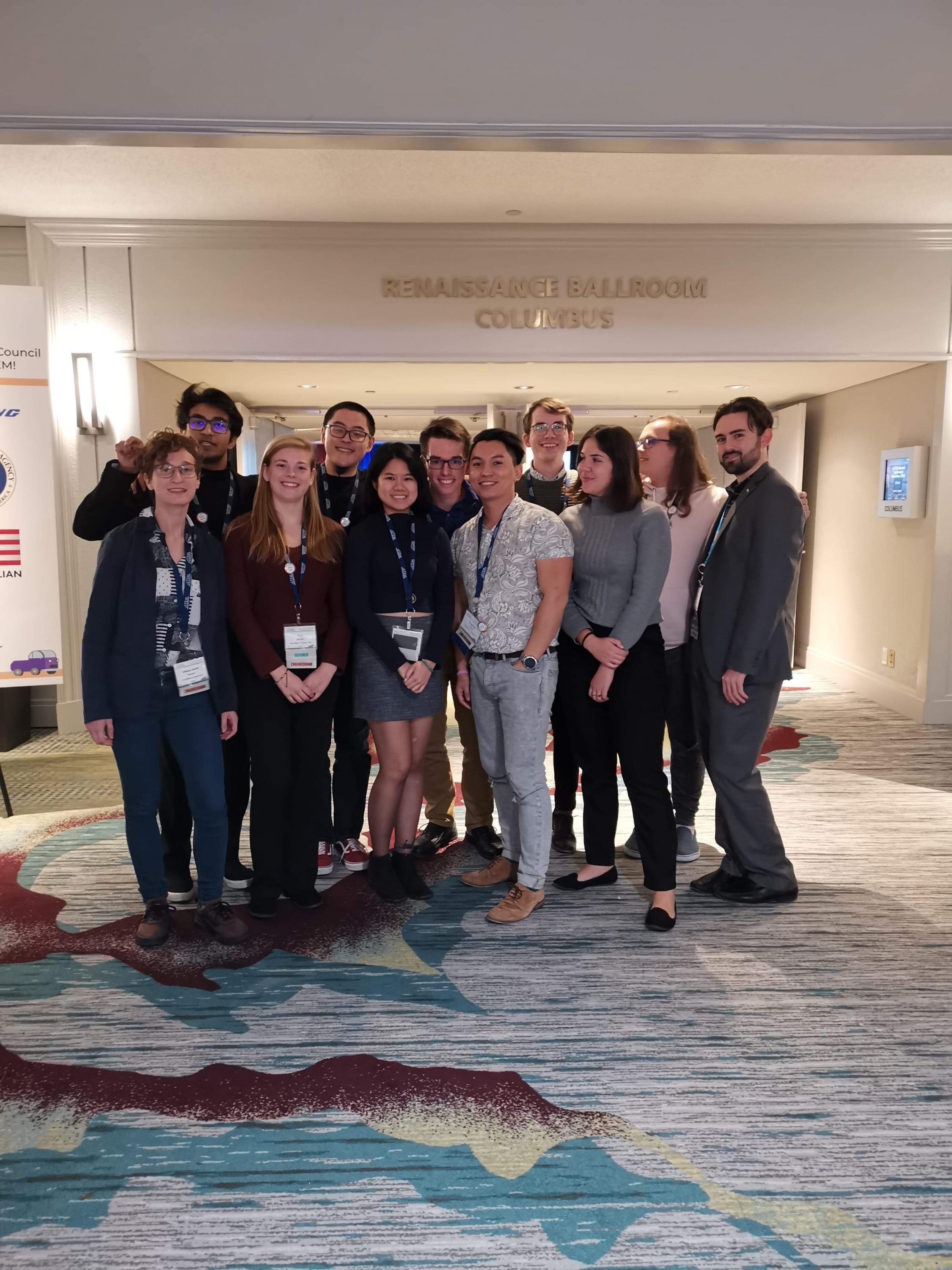 Victoria (middle, front) with friends at the 2019 oSTEM conference.